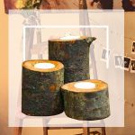 Log tealight holders with bunting and wooden ladder